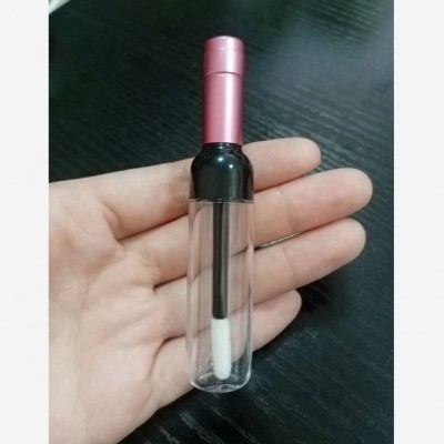 2020 empty low moq cute pink wine bottle shaped lipstick lipgloss container packaging unique lip gloss tubes with wands brush